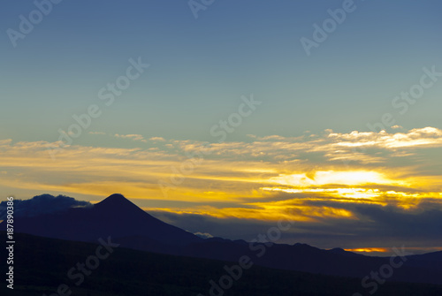 Agua volcano sunrise in Guatemala, golf club La Reunion. 3,760 m. Central America. Nature reserve attractive landscape tourism.