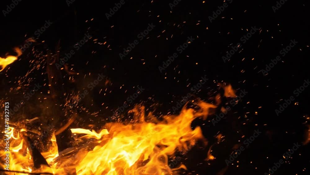 Fire in nature. Bokeh from the fire. Blurred backgrounds. Space views. Sparks are beautifully flying right at you. Shooting speed 60fps, slow motion. Live shooting of the most beautiful flame. Fire in nature. Bokeh from the fire. Blurred backgrounds. Space views. Sparks are beautifully flying right at you. Shooting speed 60fps, slow motion. Live shooting of the most beautiful flame.