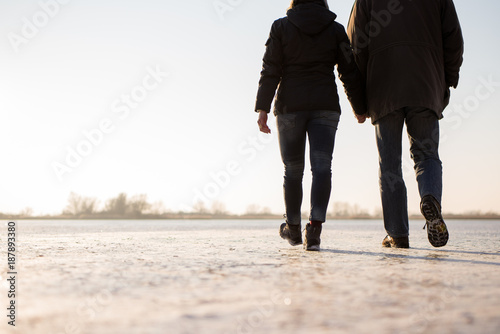 Love couple walking together, hand in hand