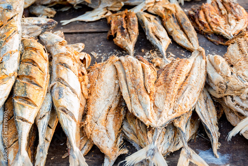 Close up sun-dried fish on wooden table