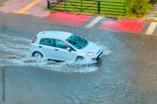 Car drives through flooded road in Mersin