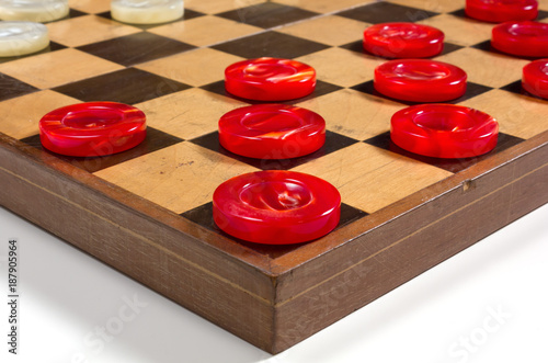 Red and White Pieces on a Checkerboard