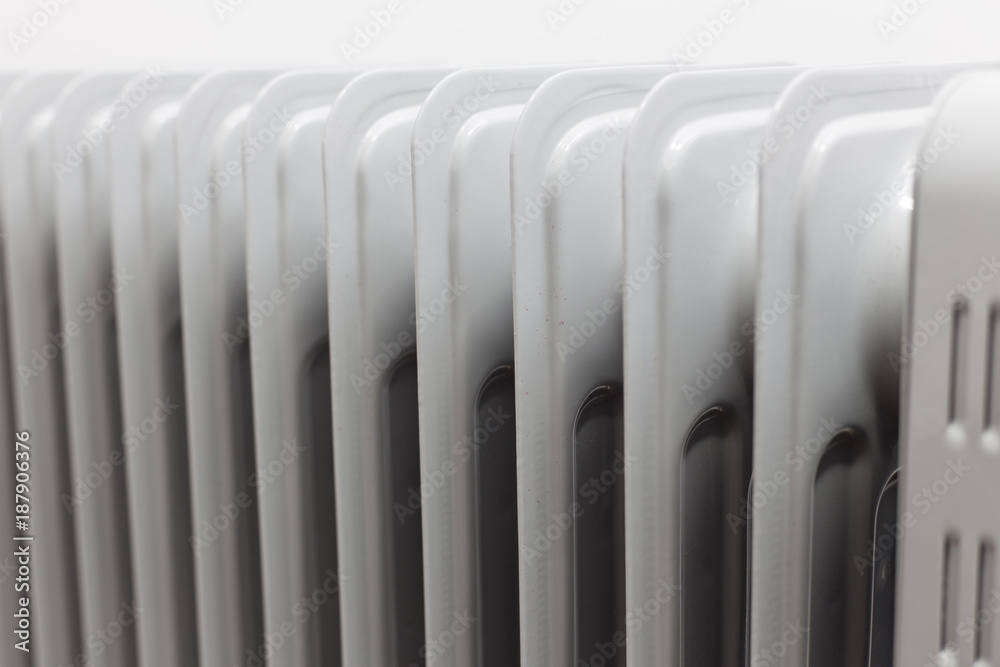 view from right horizontal at oil electric radiator heater on white background view from right horizontal at oil electric radiator heater on white background