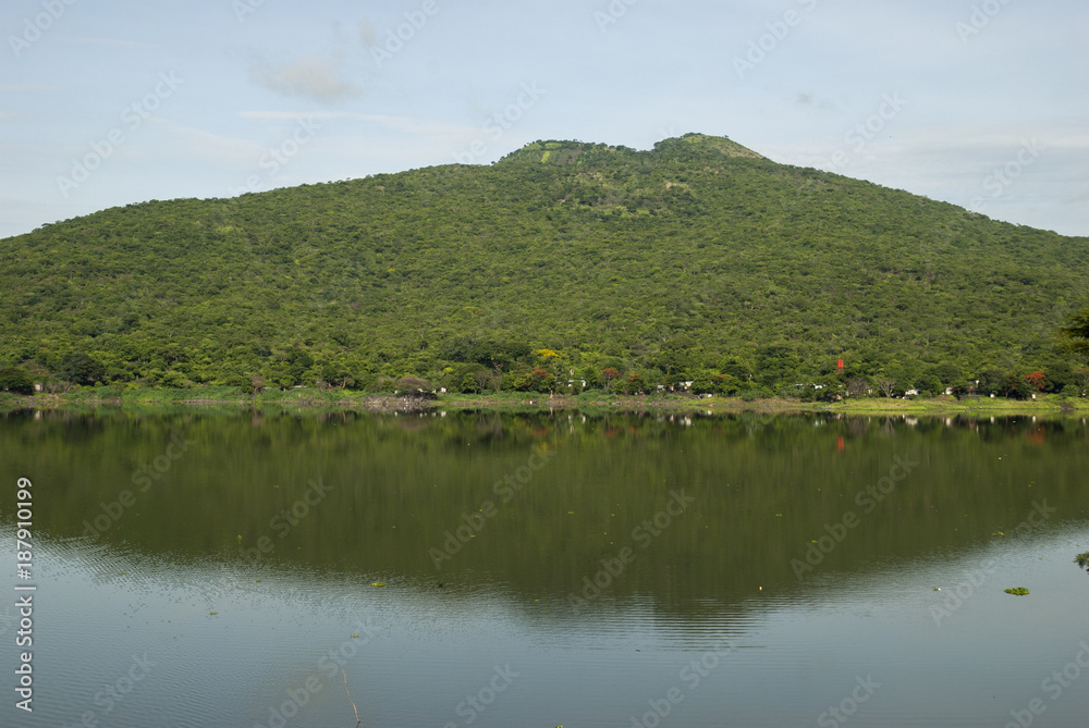 Forest lagoon Atescatempa, mountains and volcano Las Viboras in Guatemala. Jutiapa. Forest lagoon Atescatempa, mountains and volcano Las Viboras in Guatemala. Jutiapa.