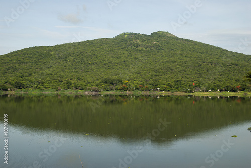 Forest lagoon Atescatempa, mountains and volcano Las Viboras in Guatemala. Jutiapa.