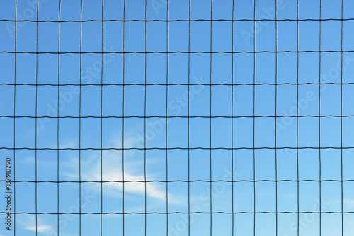 Steel mesh against the sky