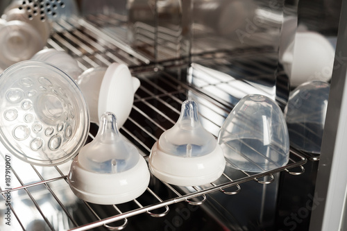 sanitizing the baby things in UV Sterilizer © NorGal