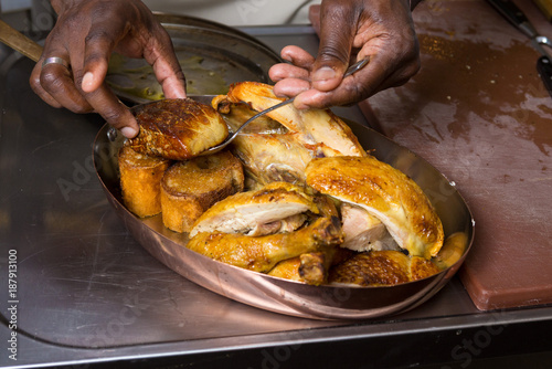 Roast chicken Foie gras being served in a metal pan