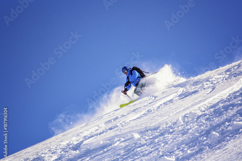 extreme skier on a steep slope