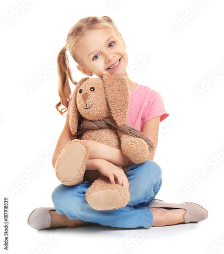 Cute little girl holding to...