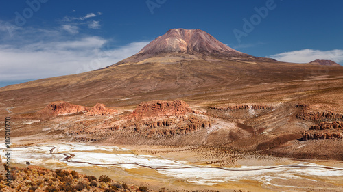 Landscape with the Cariquima volcano in the background, near the town of Cariquima and Colchane, in the Tarapaca region, Chile photo