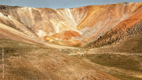 Crater of multicolored volcano, near the town of Cariquima and Colchane, in the Tarapaca region, Chile photo