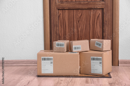 Parcel boxes on floor near ...