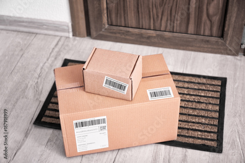 Parcel boxes on floor near ...