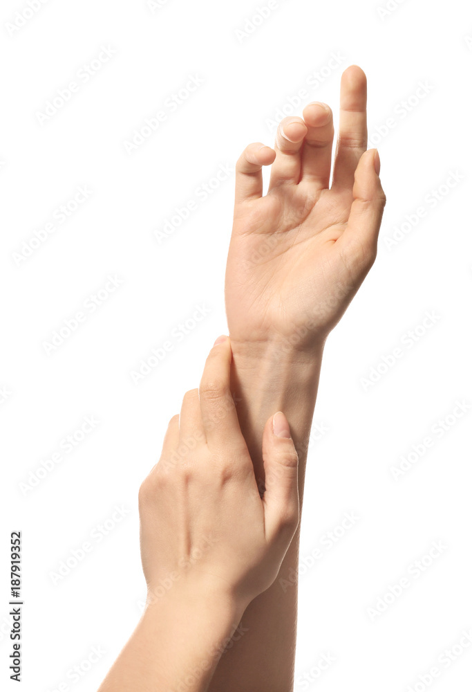 Hands of young woman with healthy skin softened by cream with moisturizing effect, on white background Hands of young woman with healthy skin softened by cream with moisturizing effect, on white background