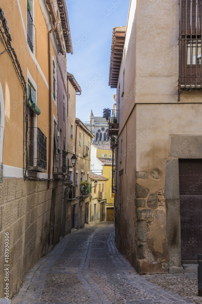 Typical medieval street in the city of Toledo. Spain