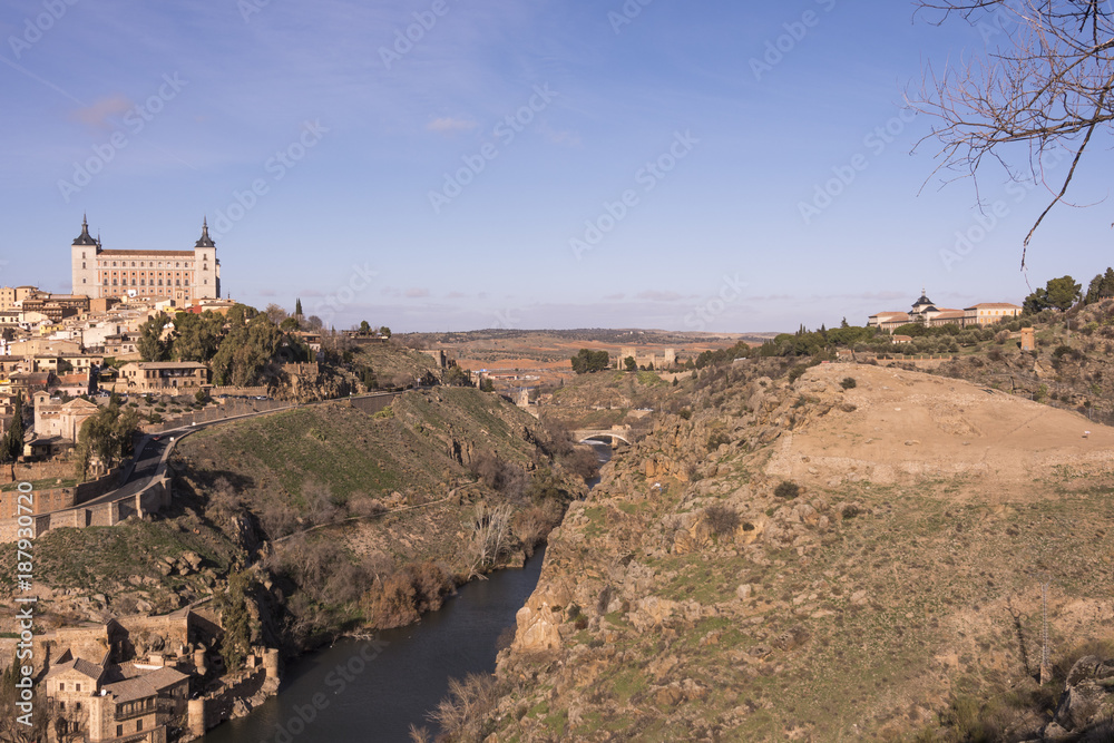 View of the city of Toledo and the river Tagus with medieval bridge. Spain