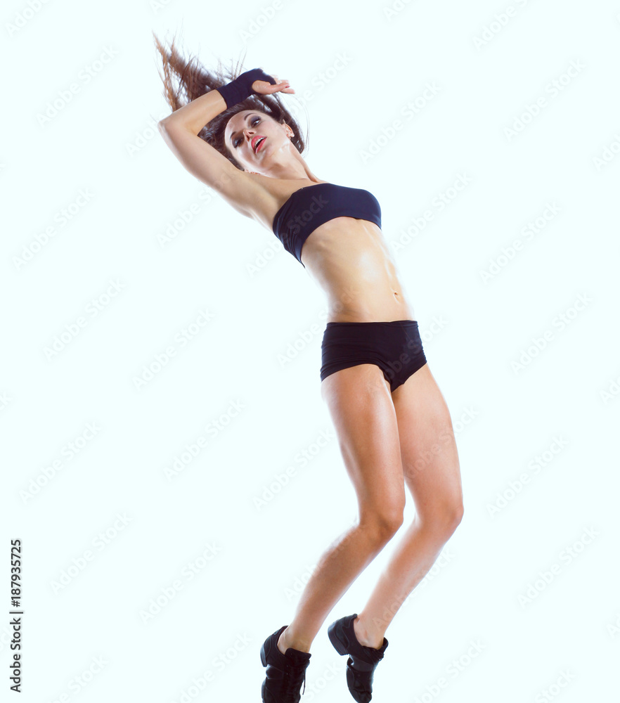Stylish and young modern style dancer is posing Stylish and young modern style dancer is posing