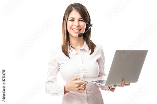 Fototapeta Nerdy woman working for tech support