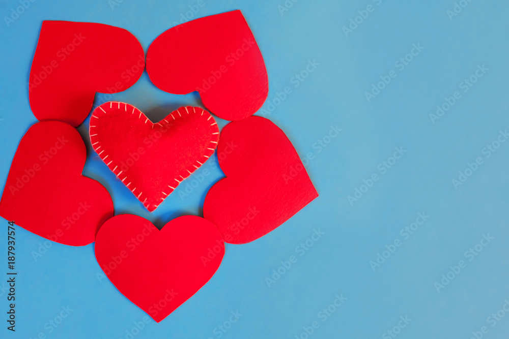 red hearts on a blue background