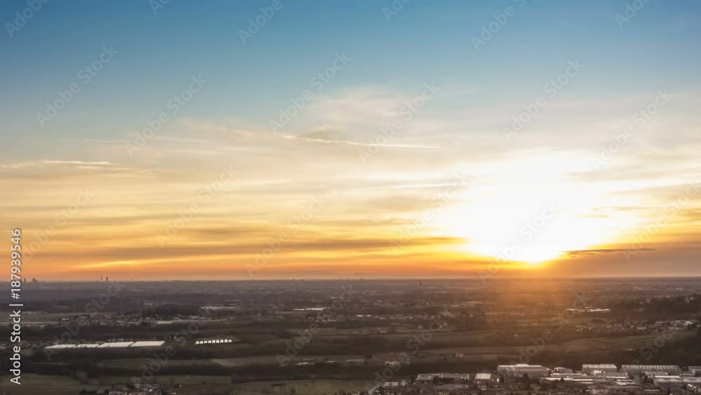 Timelapse of Milan city area and Po Valley, Italy at sunset from day to night. Aerial View Timelapse of Milan city area and Po Valley, Italy at sunset from day to night. Aerial View