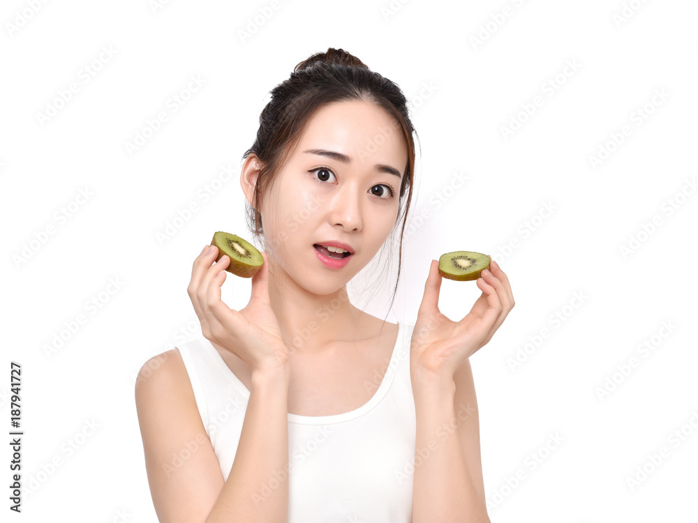 Kiwi is great for health - Healthy fruit. Funny bezutiful woman holding kiwi fruit Kiwi is great for health - Healthy fruit. Funny bezutiful woman holding kiwi fruit