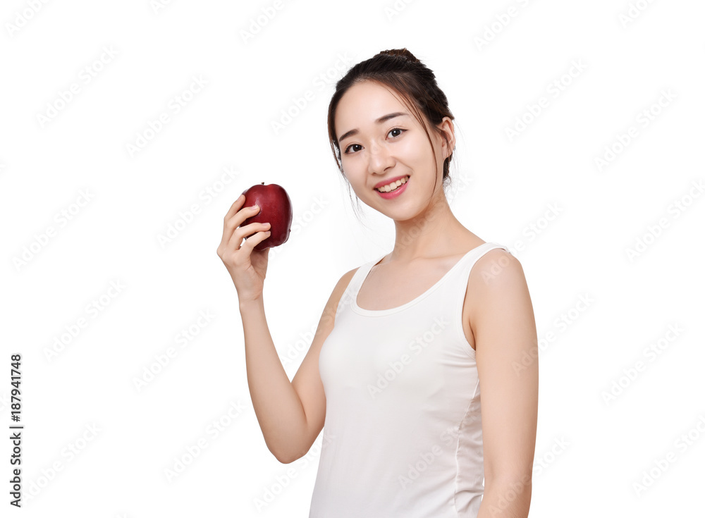 Happy healthy girl. Toothy smile portrait of a beautiful young woman, holding an apple, isolated on white. Happy healthy girl. Toothy smile portrait of a beautiful young woman, holding an apple, isolated on white.