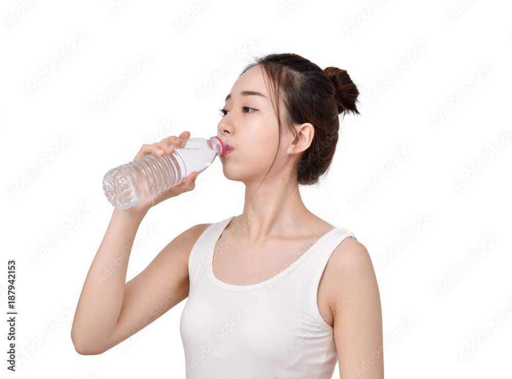 Beautiful Asian young woman drinking water bottle Beautiful Asian young woman drinking water bottle