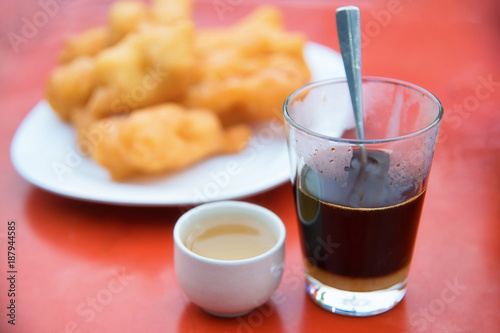 raditional coffee with Chinese breadstick. photo