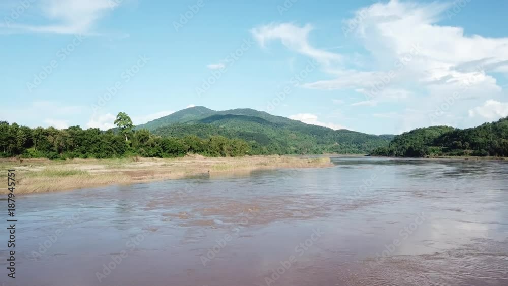 An aerial view from a drone of Mekong river, rain forest and mountains in Thailand and Laos
An aerial view from a drone of Mekong river, rain forest and mountains in Thailand and Laos