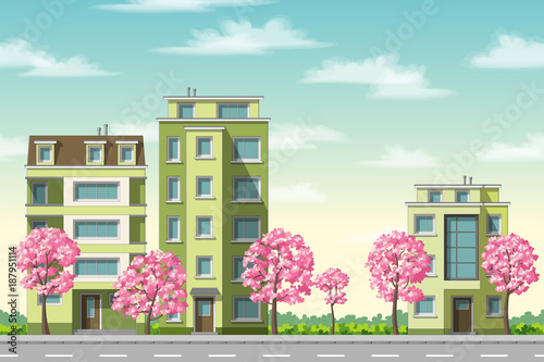 Some houses with flowering trees