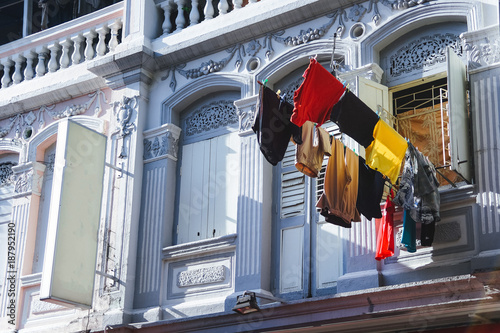 Clothes drying from the Windows. photo