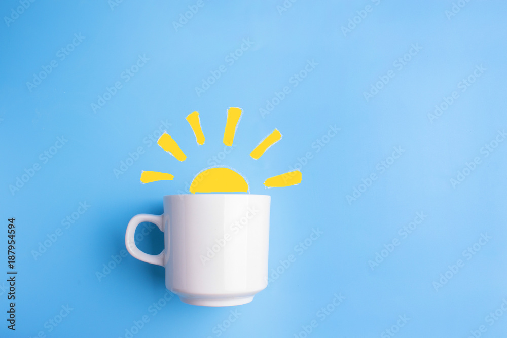 sun and white cup on blue background - obrazy, fototapety, plakaty 