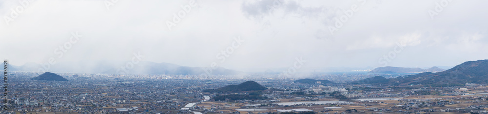 パノラマ風景　雪舞う高松市街地　香川県高松市～三木町の街並み