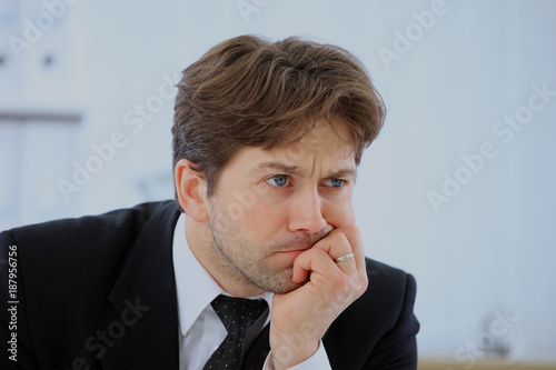 Business man stress or depression isolated on white background .