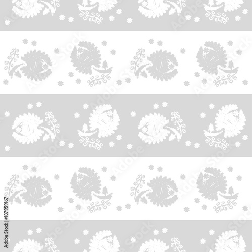 White flowers on a gray background. White lace Texture. Seamless background.
