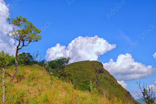 Mountain valley landscape,clounds blue sky at Khao Khieo Sun Nork Wua Mountain, Kanchanaburi Thailand photo