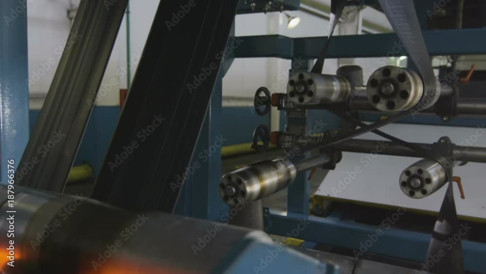 Modern Machine Tool with Rollers Moves Tyre Rubber Modern Machine Tool with Rollers Moves Tyre Rubber