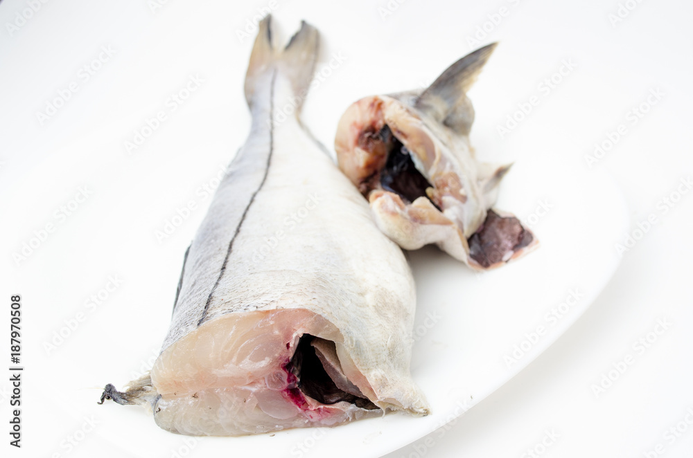 fish fresh close-up on a white plate fish fresh close-up on a white plate