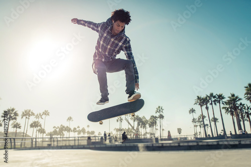 Skater boy practicing at the skate park