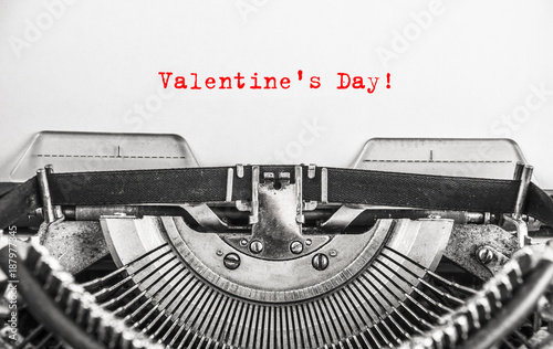 written with the vintage typewriter Valentine's Day in red ink.