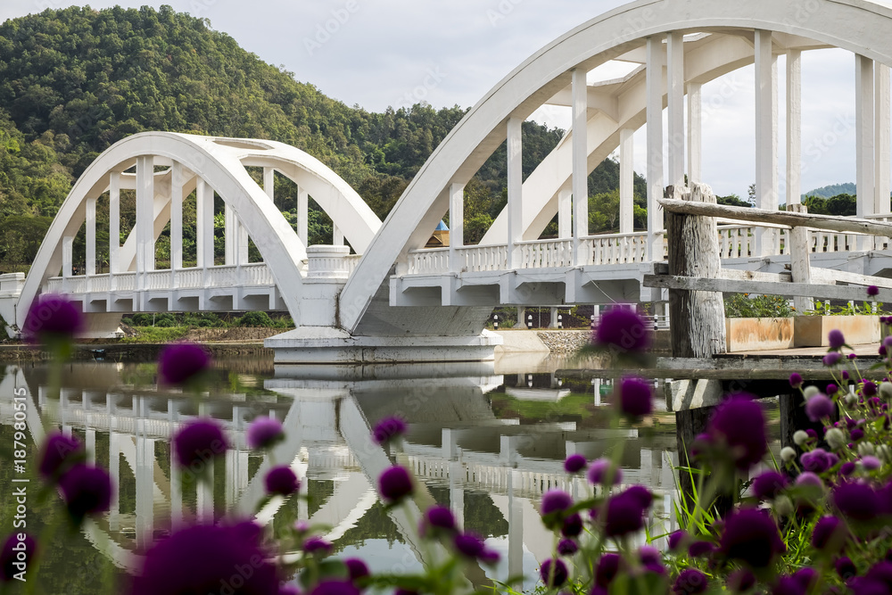 Fototapeta premium Lampang white bridge across Wang river