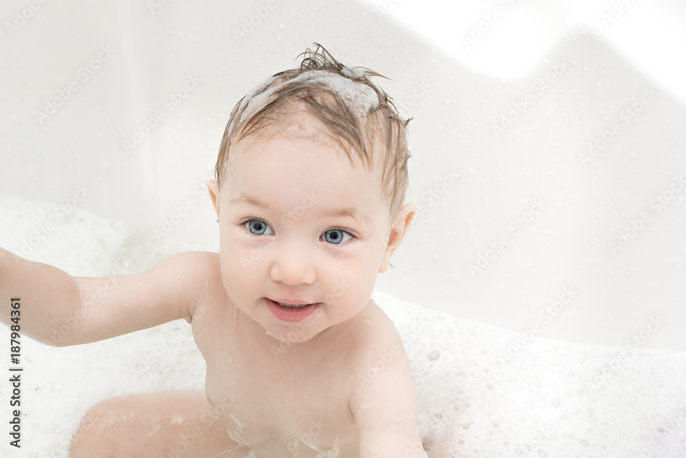 Happy baby girl bathing in bath Happy baby girl bathing in bath
