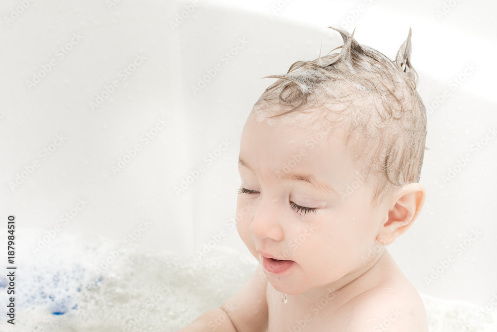 Happy baby girl bathing in bath Happy baby girl bathing in bath