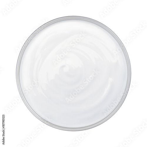 Sour cream in bowl isolated on white background. Top view