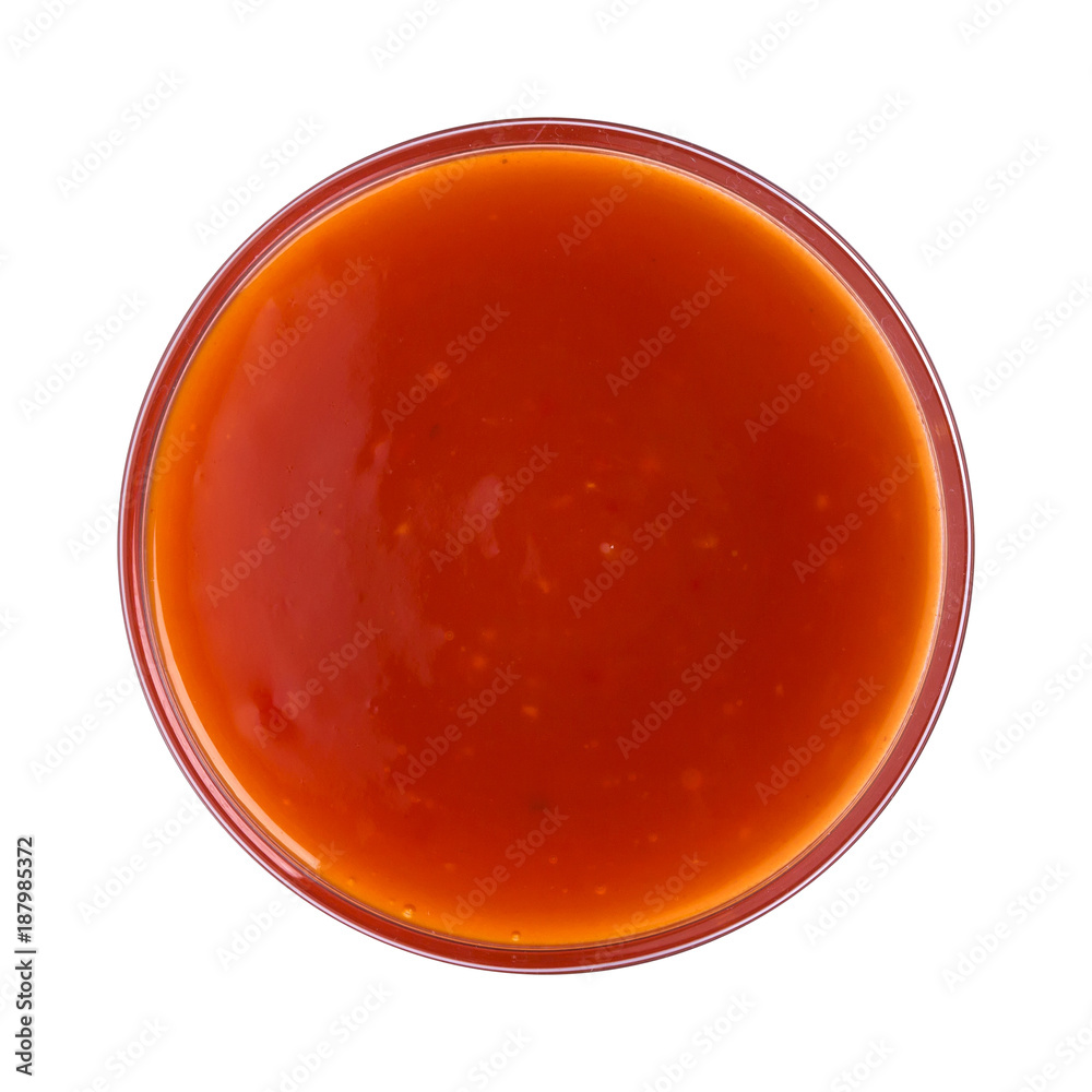 Hot chilli sauce in bowl isolated on white background. Top view Hot chilli sauce in bowl isolated on white background. Top view