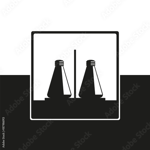 Pepper and salt shaker. Vector icon in black and white form.