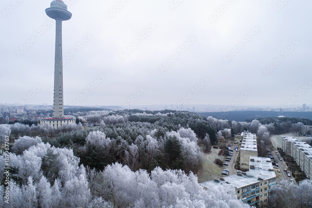 Aerial view over capital city Vilnius symbol TV Tower surrounded by old  soviet time architecture in Karoliniskes district, Vilnius, Lithuania.  During frosty winter daytime. Stock Photo | Adobe Stock