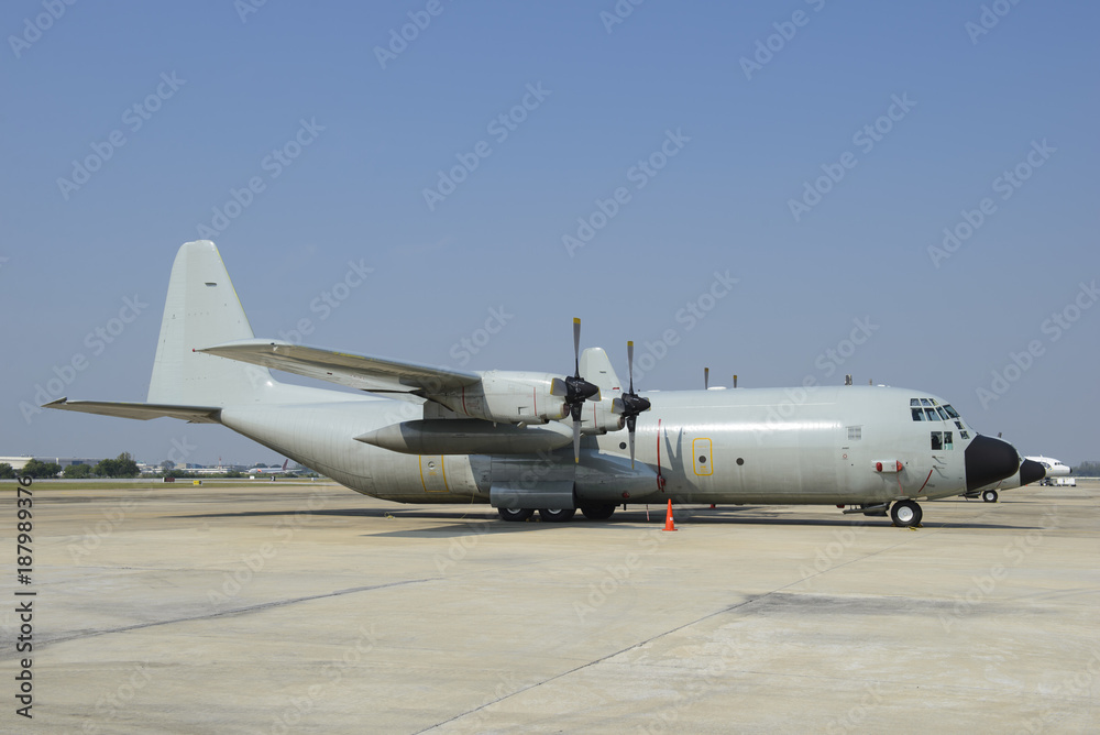 Hercules military transport plane at airport Hercules military transport plane at airport