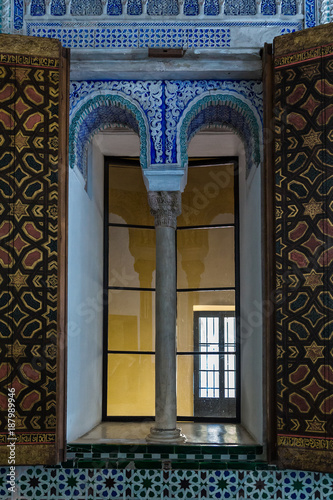 Ancient window in the Reales Alcazares of Seville. Andalucia. Spain.